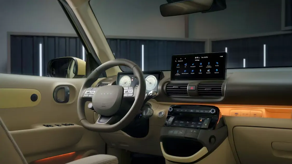 Intérieur du Hyundai INSTER électrique, tableau de bord digital et finitions modernes